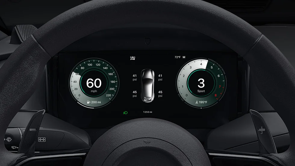 A CarPlay Ultra screen shows tire pressure in the instrument cluster of an Aston Martin.