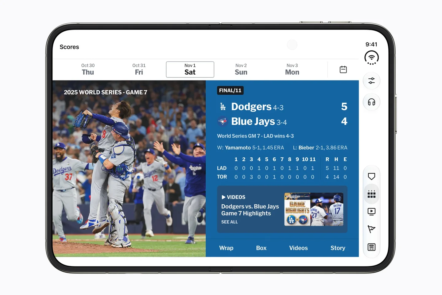 A fully flat open iPhone Duo shows the MLB app, where a user is looking up information for the 2025 World Series.